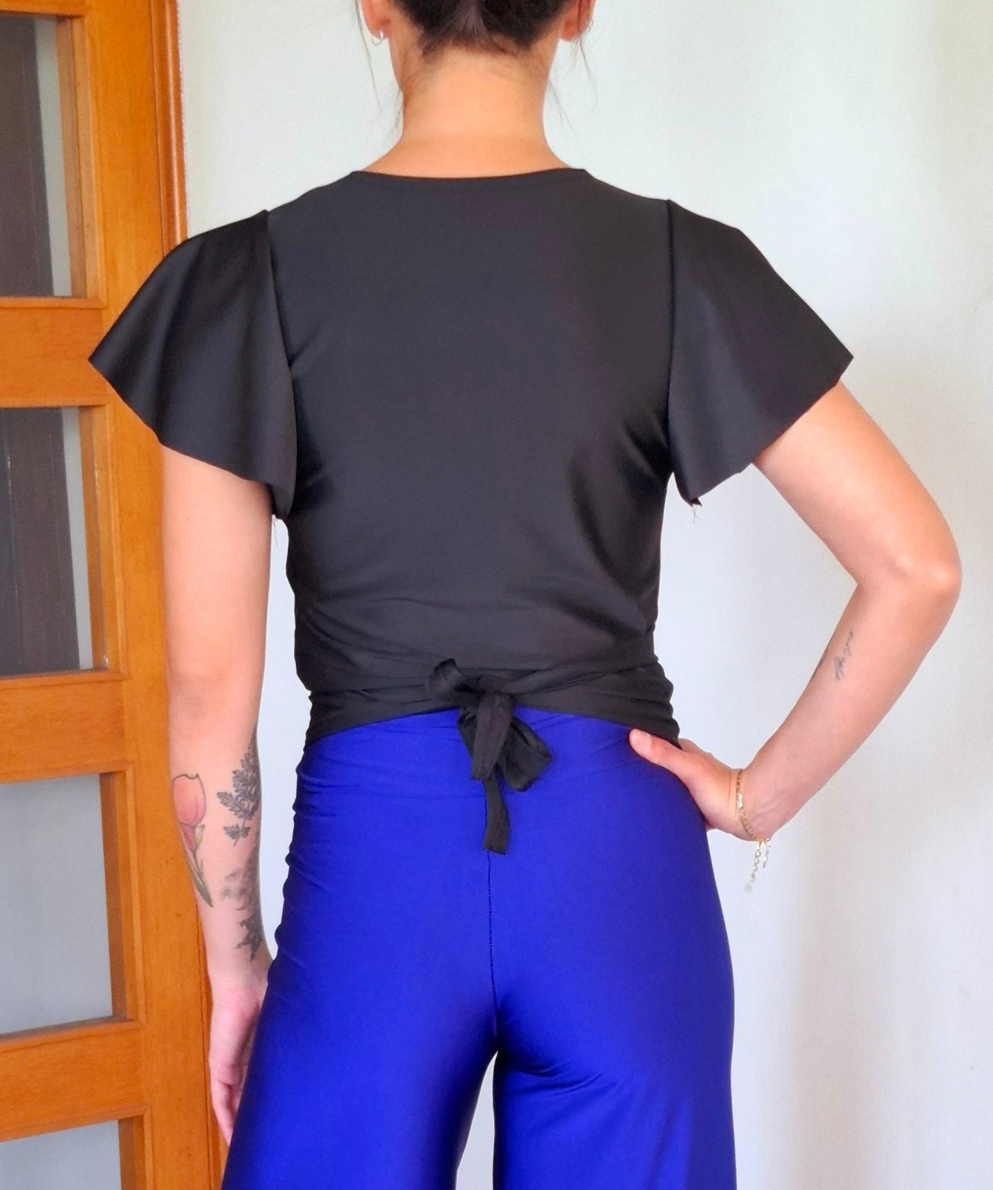 POLERA RUK NEGRA ENVOLVENTE