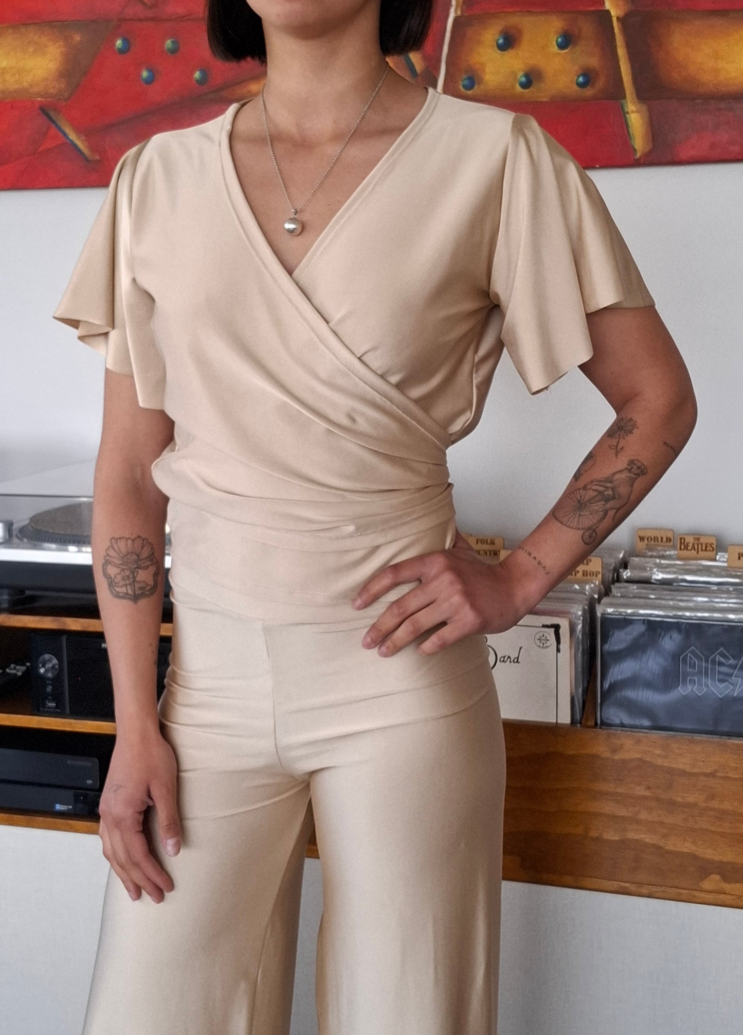 POLERA RUK BEIGE ENVOLVENTE