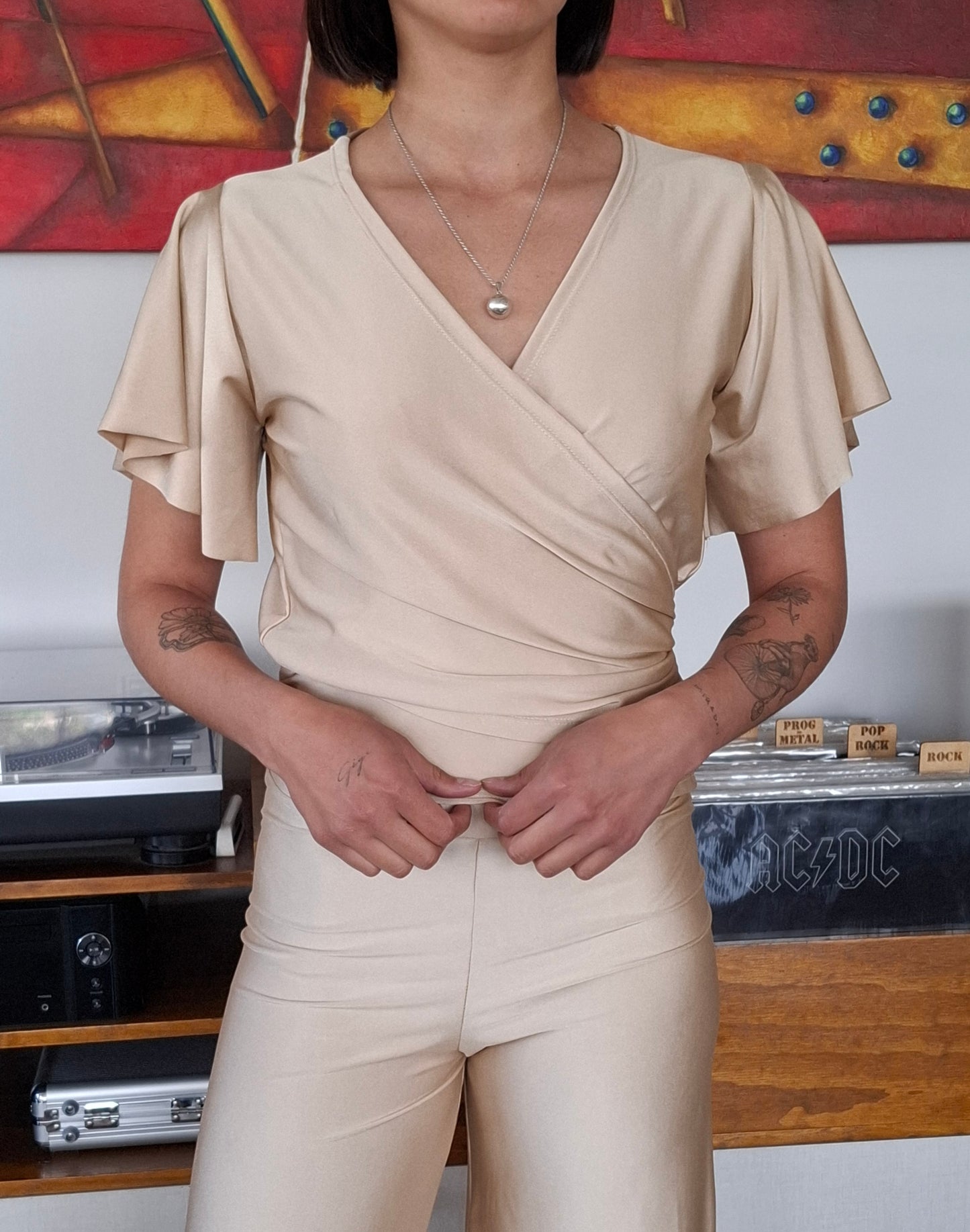 POLERA RUK BEIGE ENVOLVENTE
