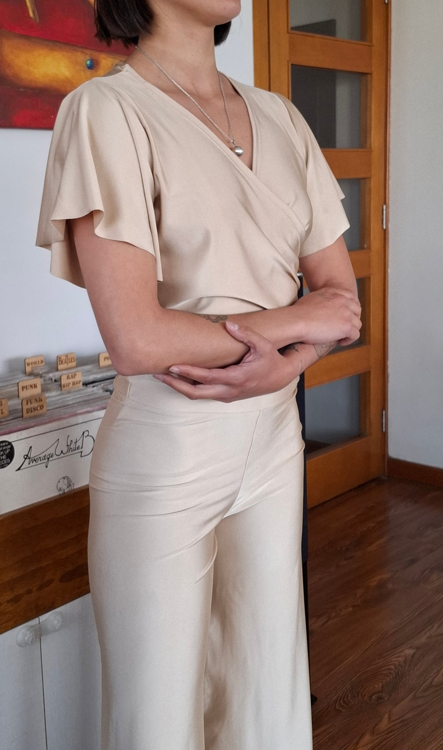 POLERA RUK BEIGE ENVOLVENTE