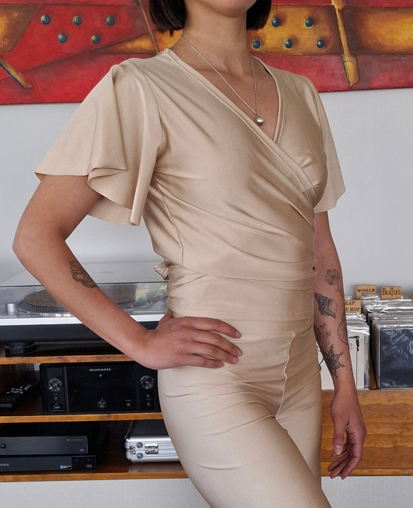 POLERA RUK BEIGE ENVOLVENTE