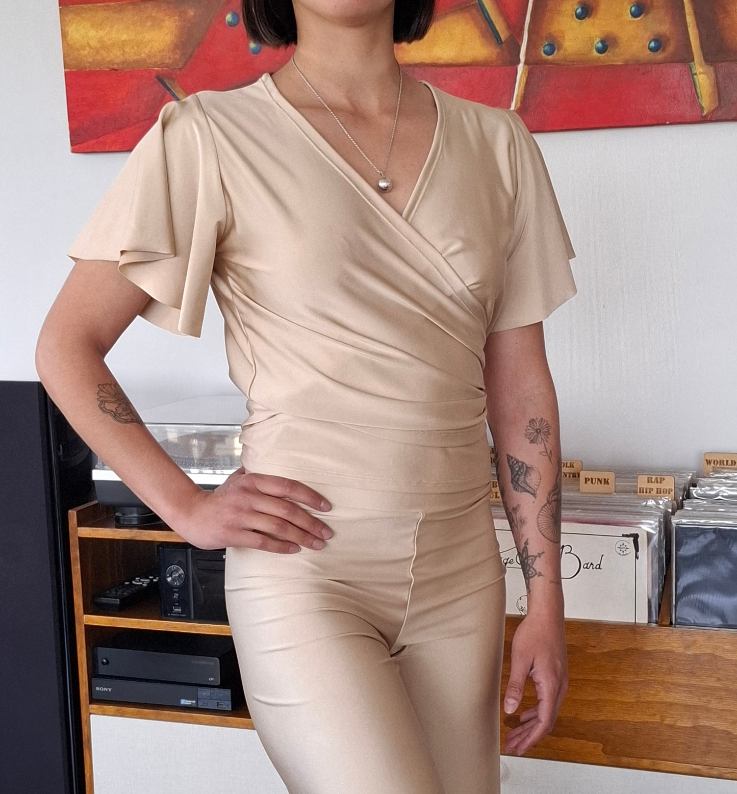 POLERA RUK BEIGE ENVOLVENTE